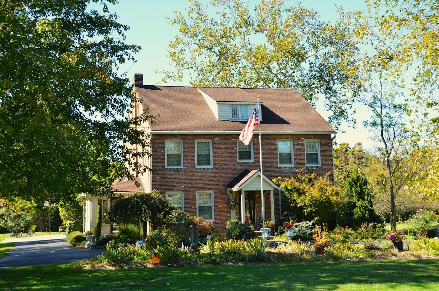 Green lawn in front of a home in Orangeville